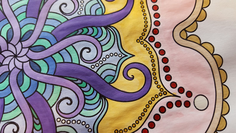 a portion of a mandala with purple tentacles at the center reaching into a yellow zone, outside of which is a pink zone with red dots